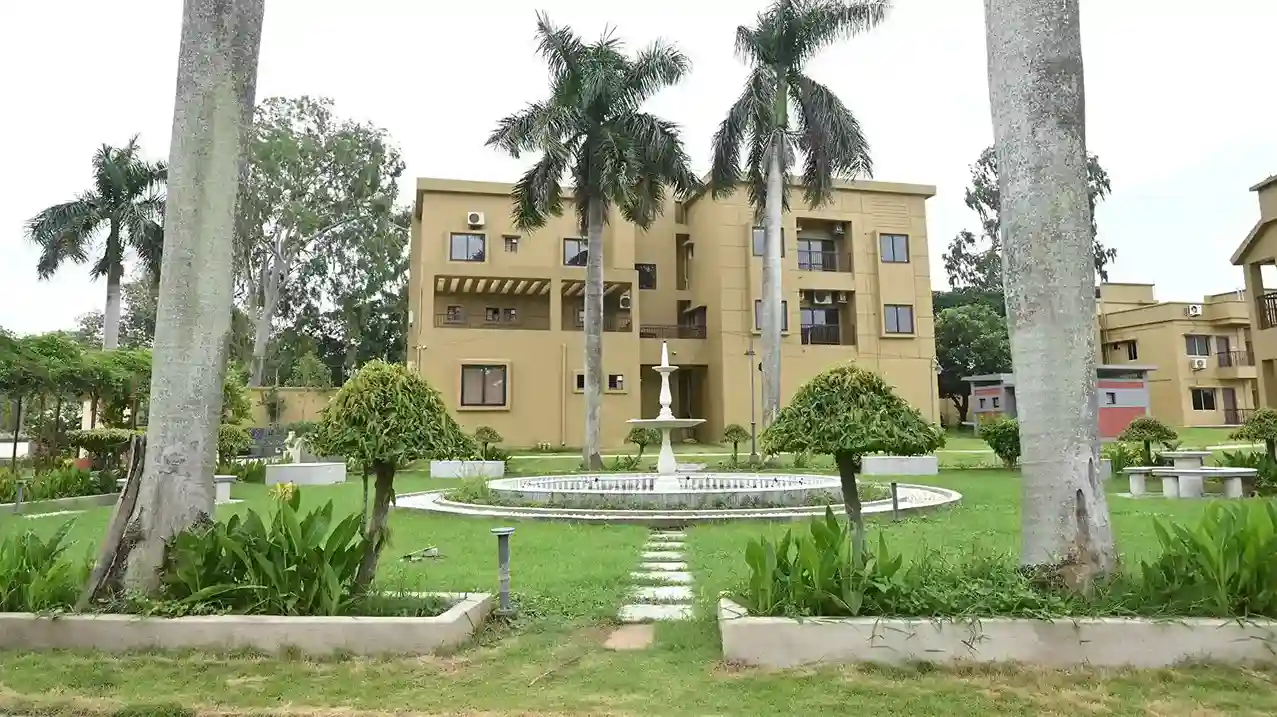 Campus Entrance — Green Surroundings